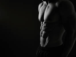 Monochrome male torso showing abs 