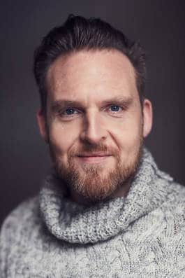 Axel Stein in a smiling pose 