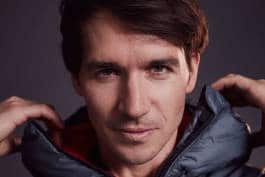 Neureuther pulling up jacket's collar confidently 