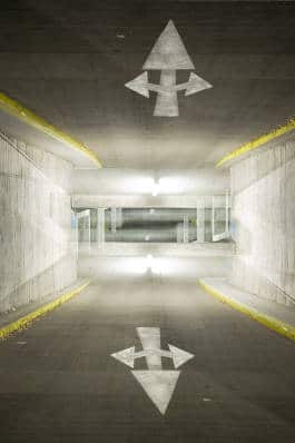 Underpass with directional arrow signs 