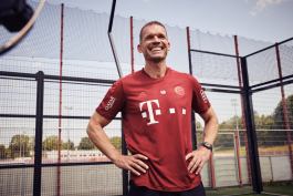 Holger Broich Smiling in FC Bayern red shirt 